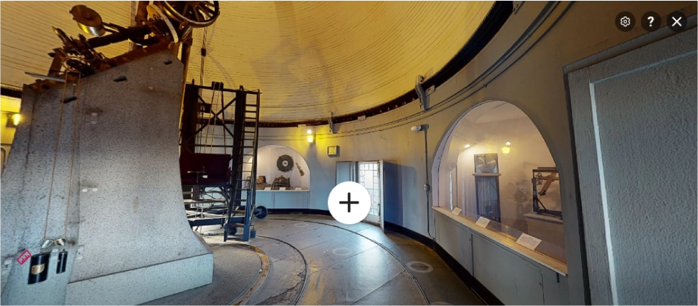 Inside the dome of a telescope taller than a person